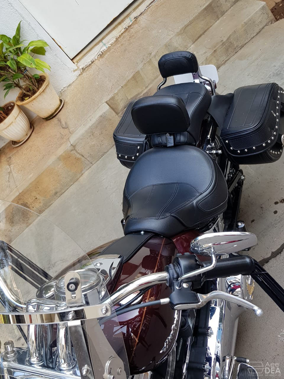 Contoured rider backrest for improved touring comfort