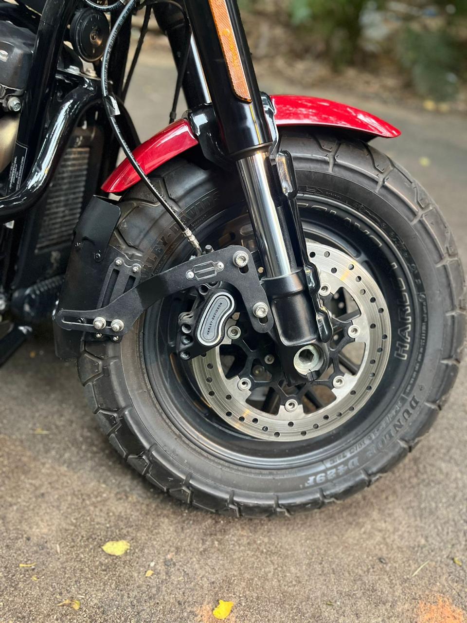 Harley Fat Boy front mudslinger installed on front wheel