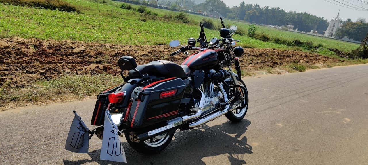 Glossy black Sportster 48 side panniers by AeeDEA