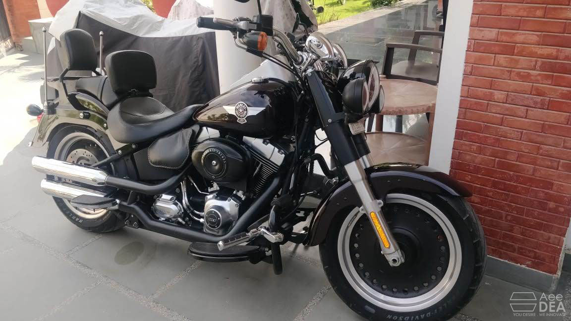 Touring rider backrest for Harley Fat Boy motorcycles